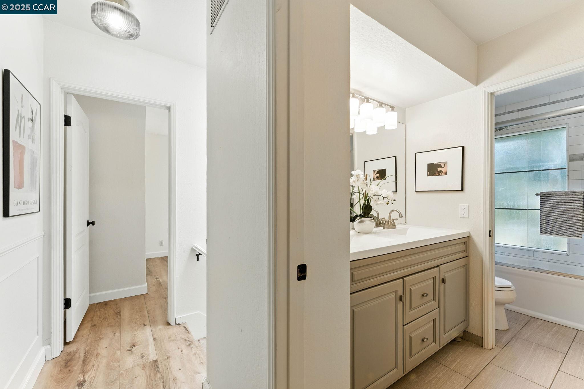 1660 San Luis Road Walnut Creek, CA 94597 - Photo 21 of 46 a spacious bathroom with a double vanity sink a mirror and a shower
