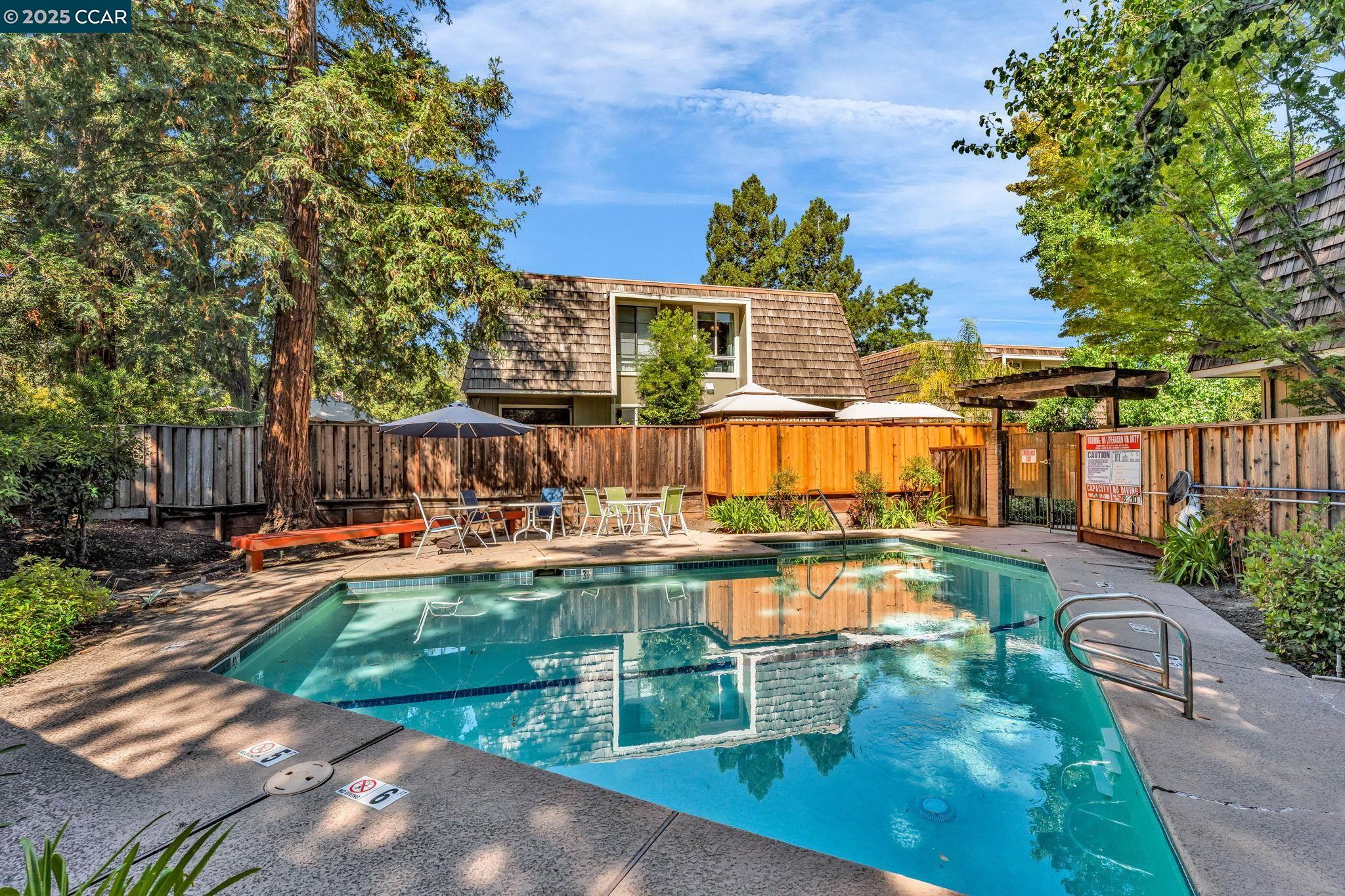 1660 San Luis Road Walnut Creek, CA 94597 - Photo 43 of 46 a view of a swimming pool with a patio