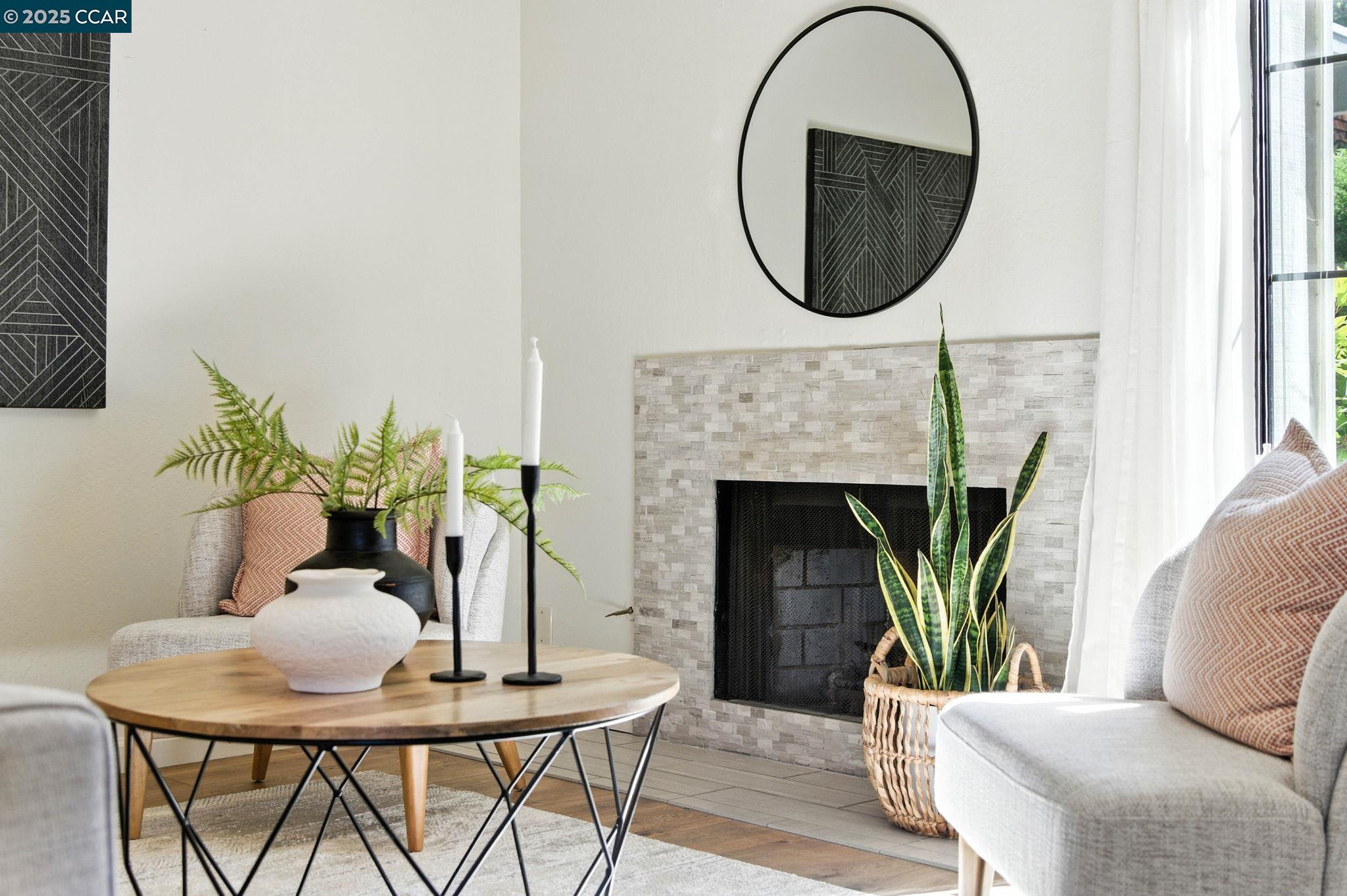 1660 San Luis Road Walnut Creek, CA 94597 - Photo 6 of 46 a living room with furniture a mirror and a fireplace