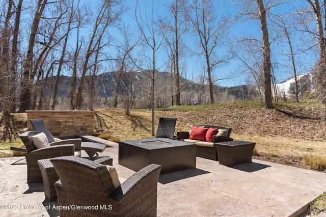 a view of swimming pool with a yard