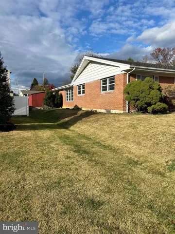 a house view with a garden space