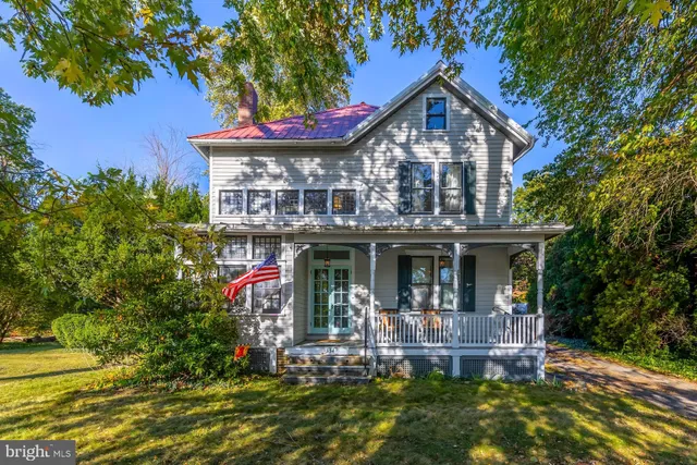 a front view of a house with yard