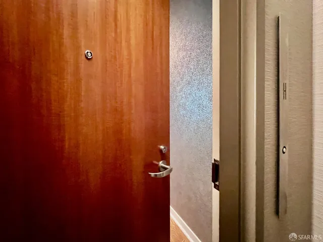 a living room with a couch and a rug