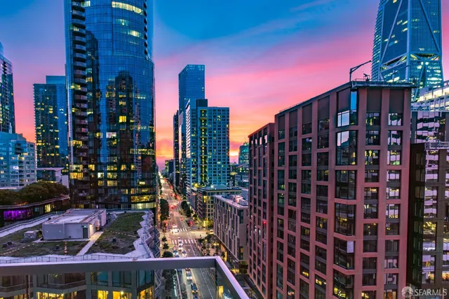 a view of a city with tall buildings
