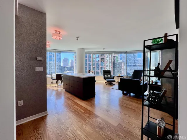 a room with furniture and a large window