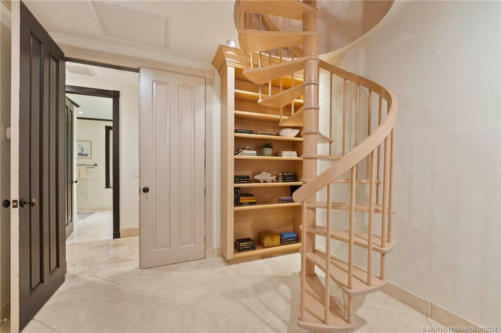24 Ridgeland Drive Stuart, FL 34996 - Photo 54 of 99 Stairs to private office on 2nd floor