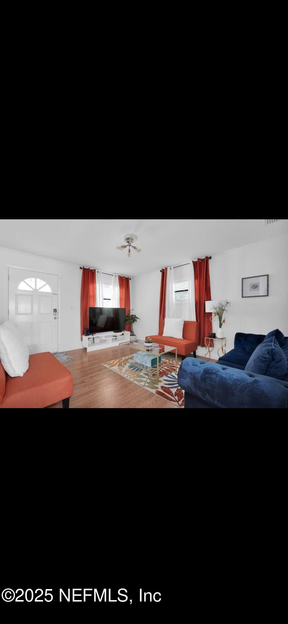 12667 Pulaski Road Jacksonville, FL 32218 - Photo 3 of 17 a view of living room with furniture and screen