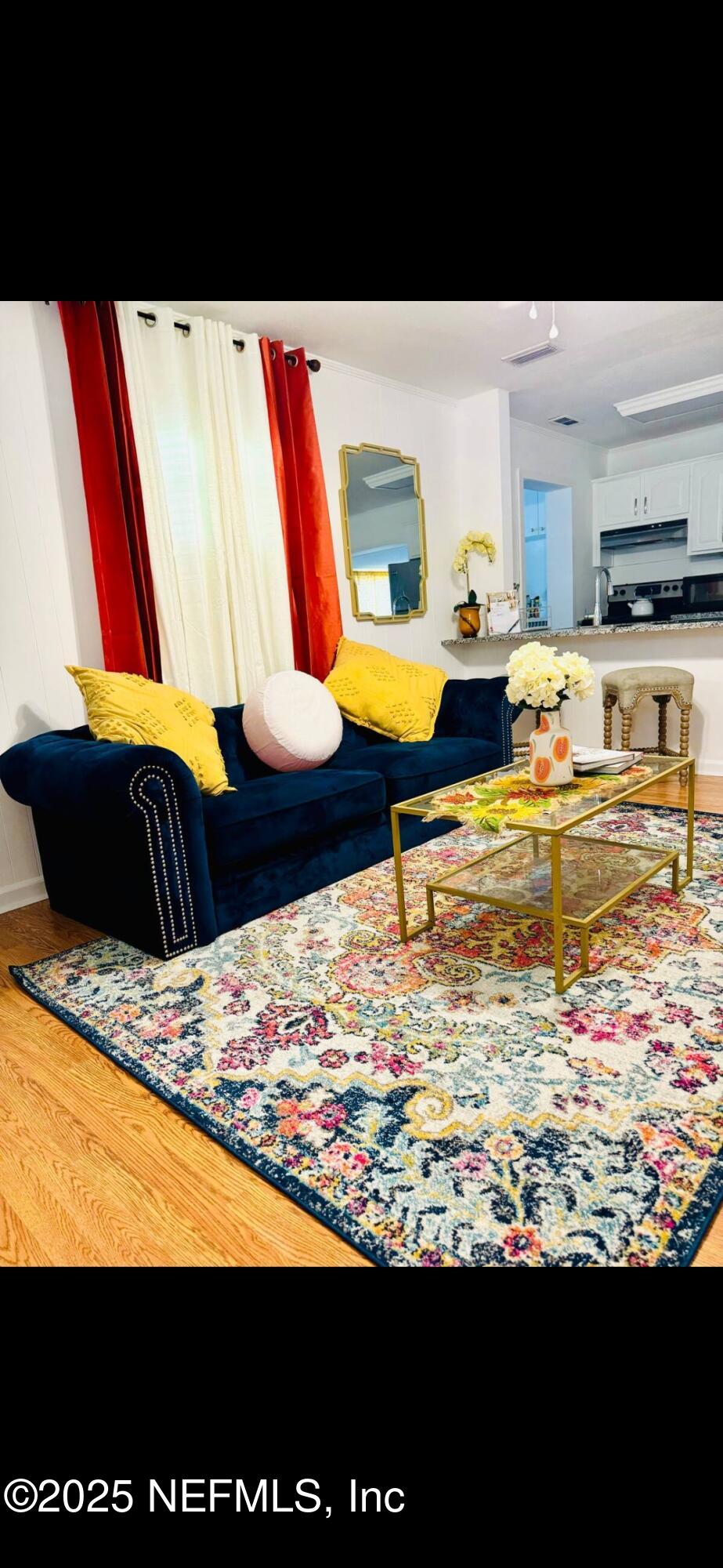 12667 Pulaski Road Jacksonville, FL 32218 - Photo 7 of 17 a view of living room with furniture and a flat screen tv