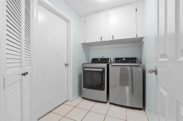 a utility room with washer and dryer