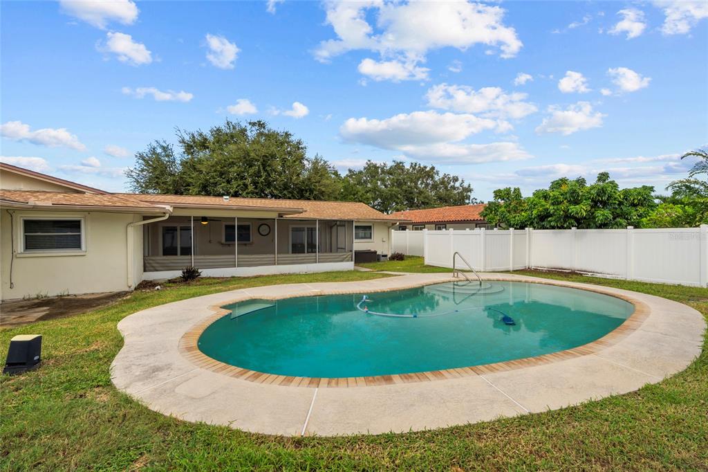 13236 84th Terrace Seminole, FL 33776 - Photo 32 of 34 a view of outdoor space yard swimming pool and outdoor seating