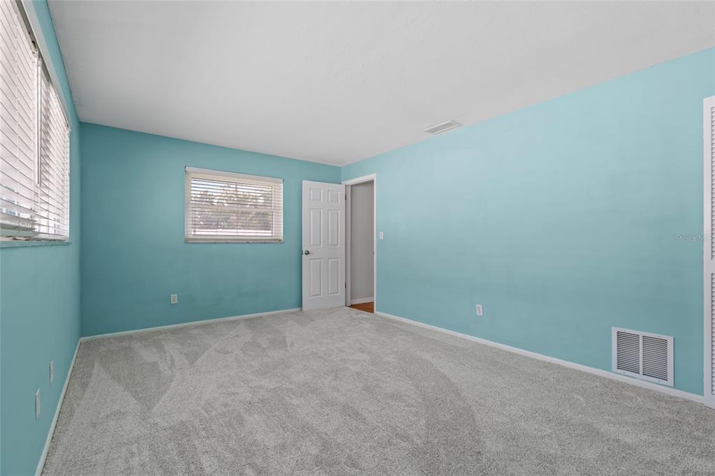 13236 84th Terrace Seminole, FL 33776 - Photo 10 of 34 a view of an empty room with a window