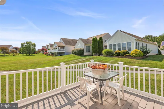 a view of a chairs and table on the terrace