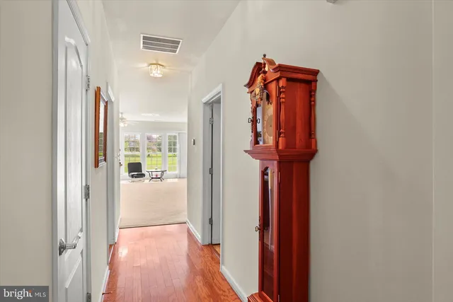 a view of front door with a hallway