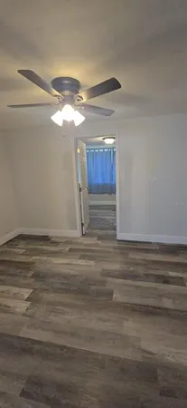 a view of a livingroom with a fan