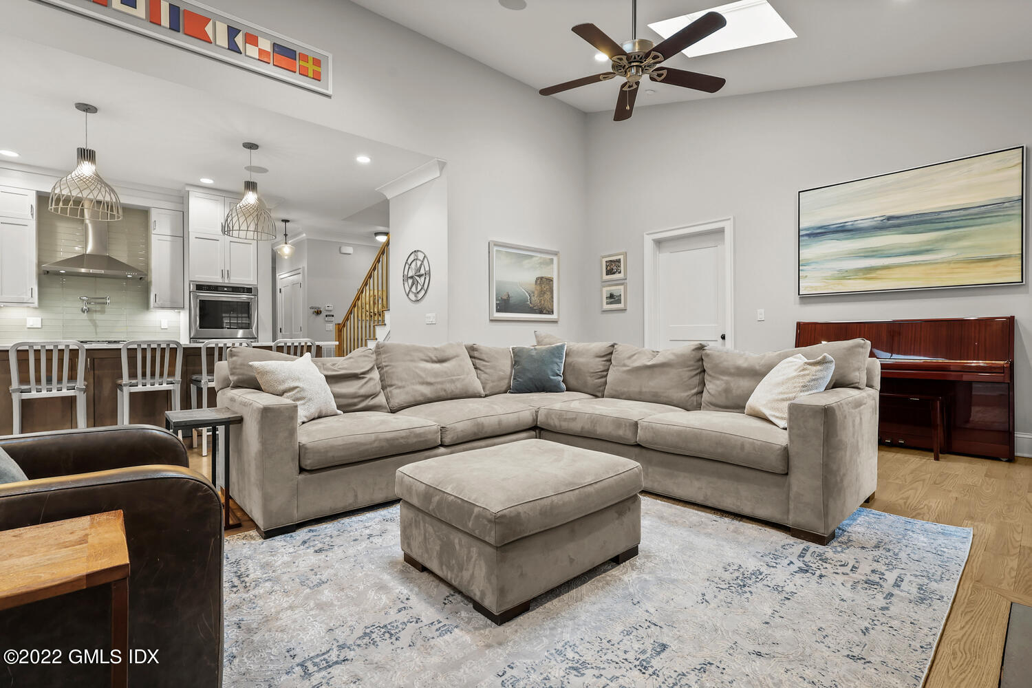 24 Neil Lane Riverside, CT 06878 - Photo 13 of 36 a living room with furniture a ceiling fan and a rug