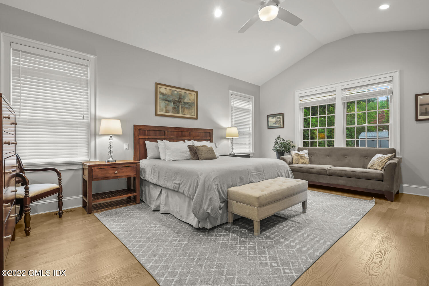 24 Neil Lane Riverside, CT 06878 - Photo 16 of 36 a spacious bedroom with a bed and a couch