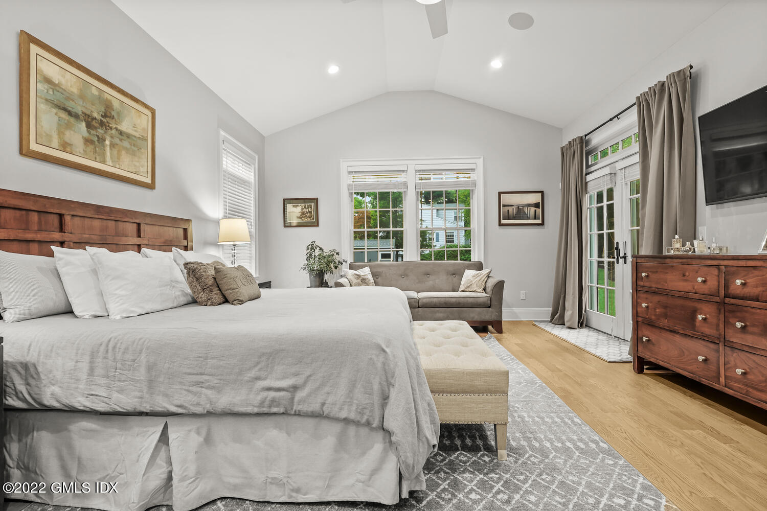 24 Neil Lane Riverside, CT 06878 - Photo 17 of 36 a bed room with a bed window and a television