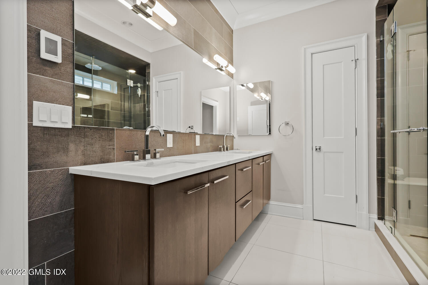 24 Neil Lane Riverside, CT 06878 - Photo 18 of 36 a bathroom with a sink and a mirror