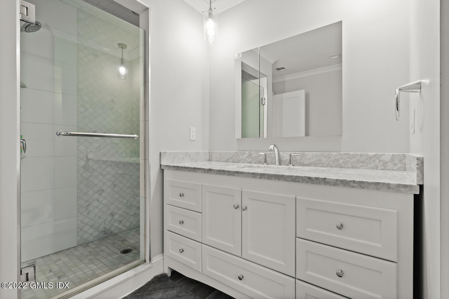 24 Neil Lane Riverside, CT 06878 - Photo 22 of 36 a bathroom with a granite countertop sink a mirror and shower