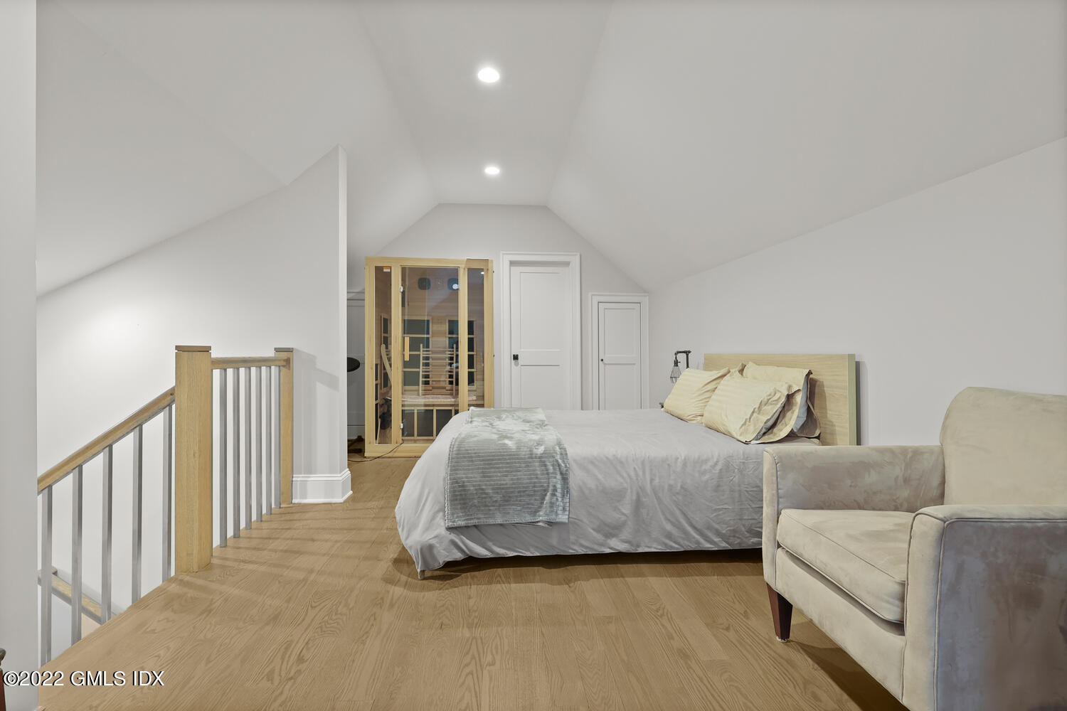 24 Neil Lane Riverside, CT 06878 - Photo 26 of 36 a spacious bedroom with a bed and a large window