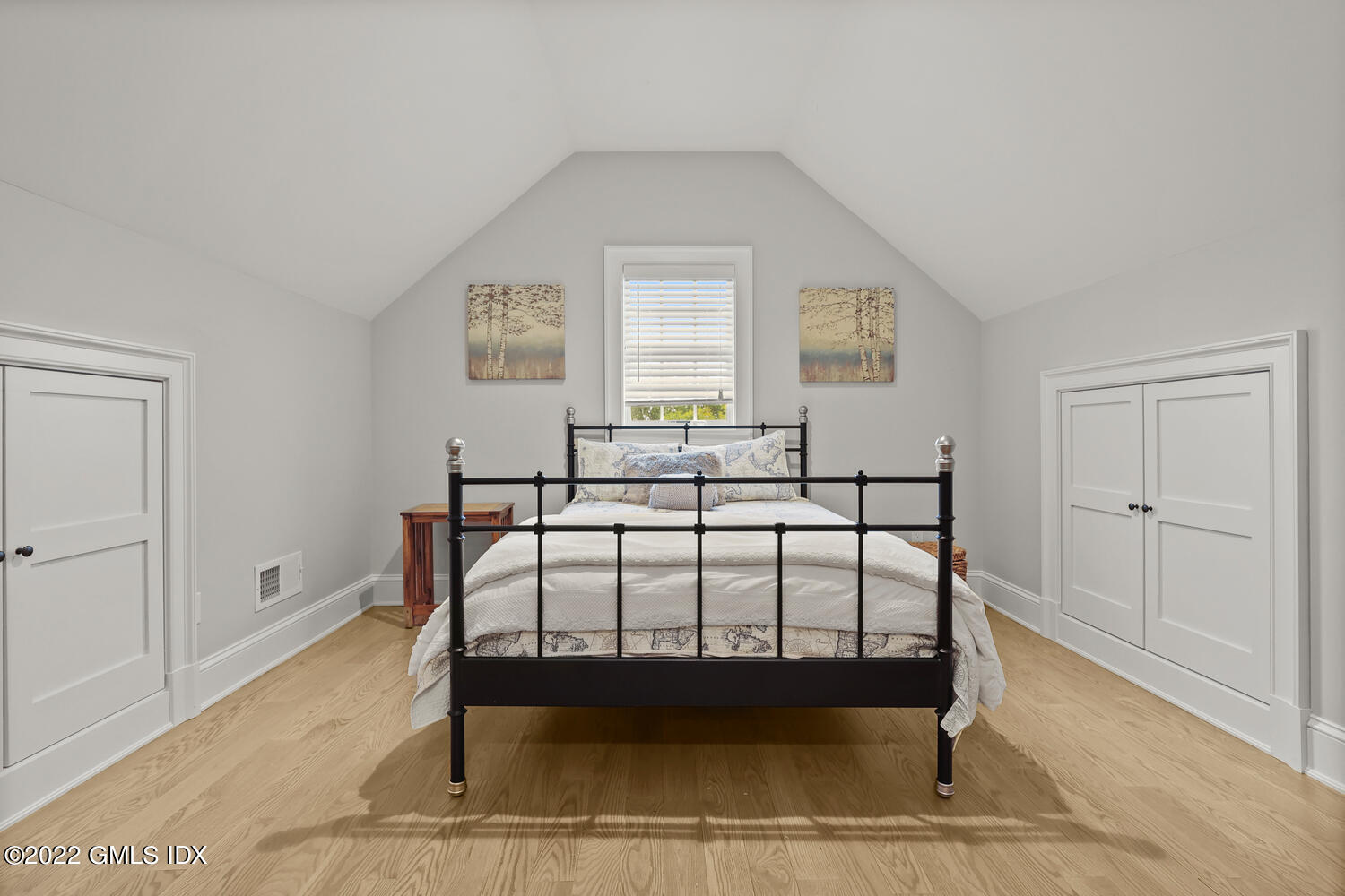 24 Neil Lane Riverside, CT 06878 - Photo 27 of 36 a bedroom with a bed and window