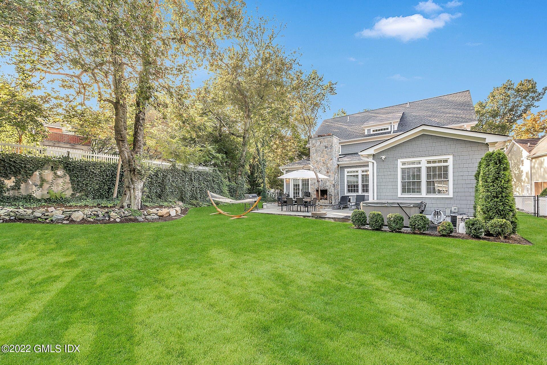24 Neil Lane Riverside, CT 06878 - Photo 35 of 36 a view of a house with a backyard
