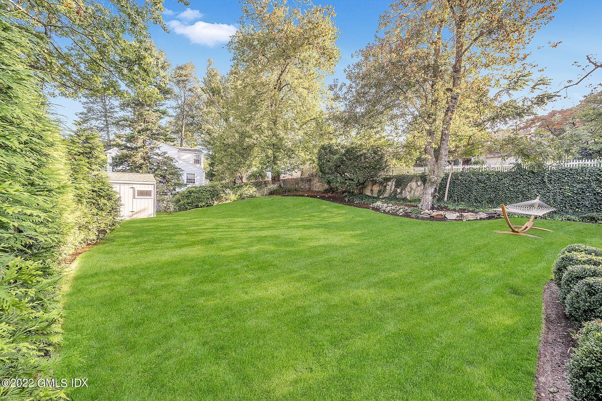 24 Neil Lane Riverside, CT 06878 - Photo 36 of 36 a view of a big yard with large trees