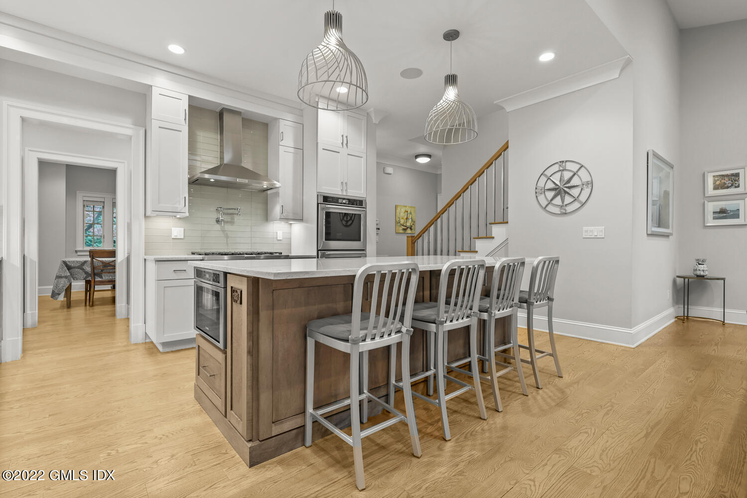 24 Neil Lane Riverside, CT 06878 - Photo 4 of 36 a view of a kitchen and dining room
