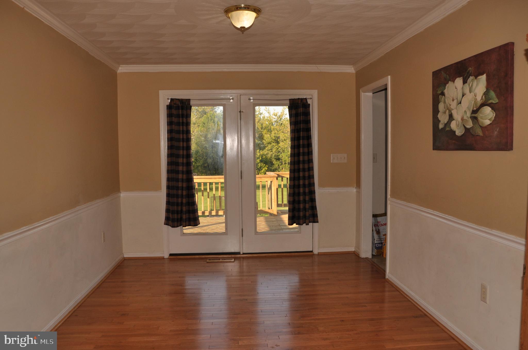 92 River Bend Road Kearneysville, WV 25430 - Photo 9 of 27 Dining room leading to large deck