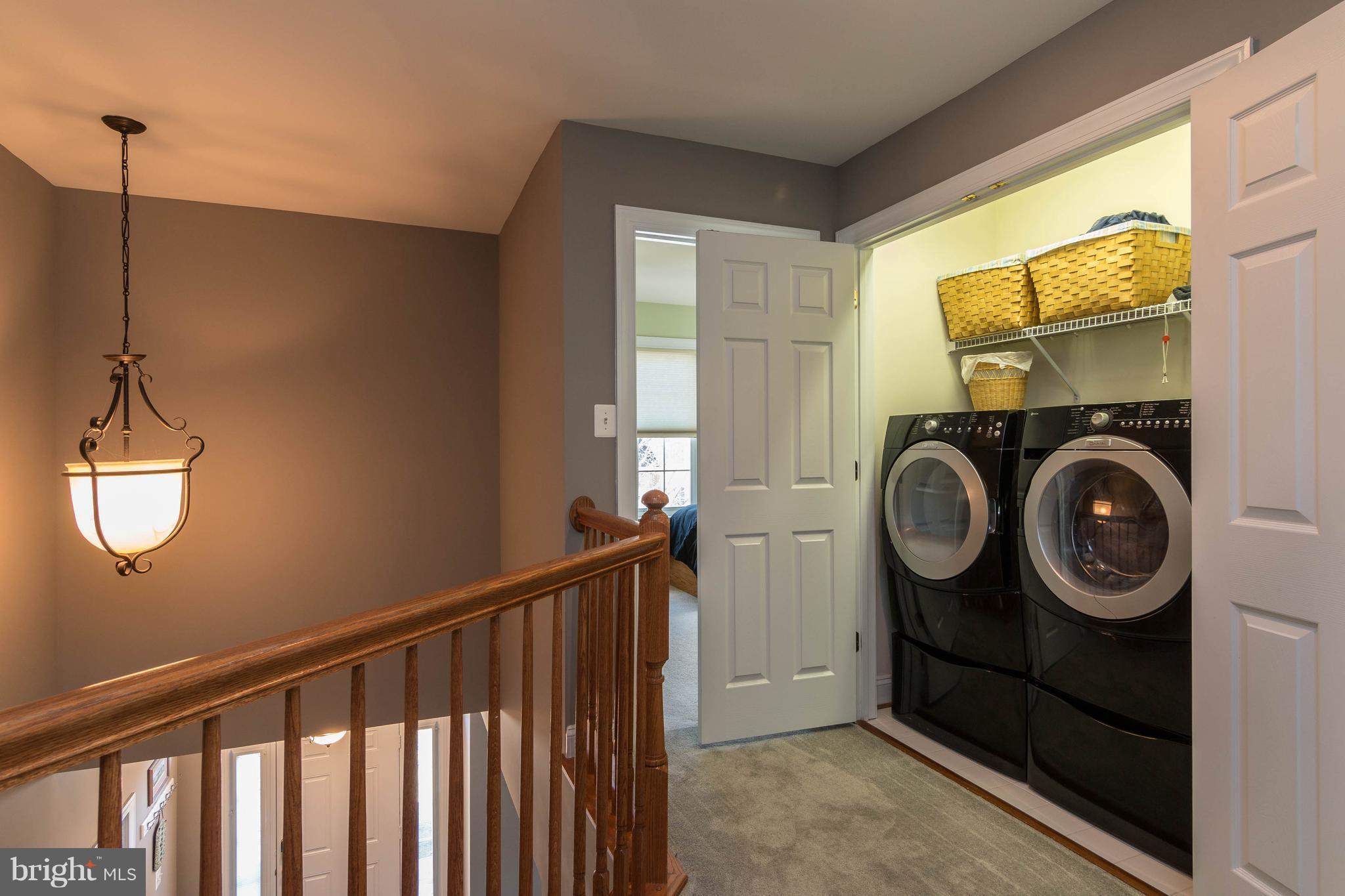 8316 Academy Road Ellicott City, MD 21043 - Photo 24 of 30 Upstairs laundry w/ washer & dryer