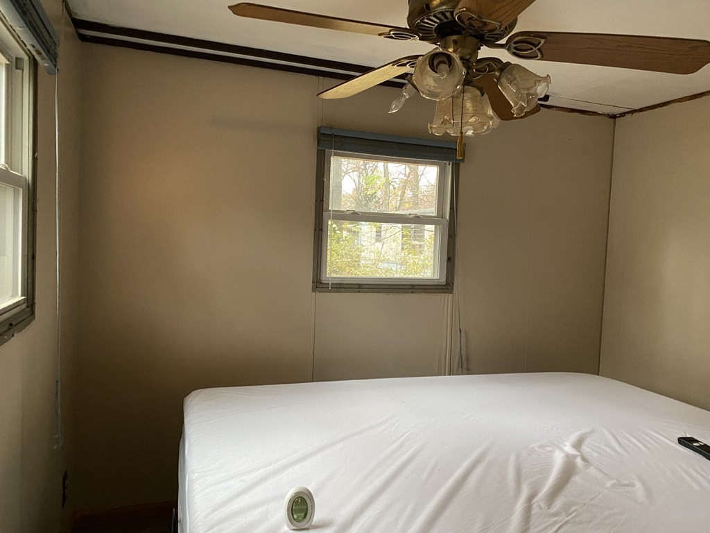 51 Rest Way Springfield, MA 01119 - Photo 9 of 11 a bedroom with a bed and a window
