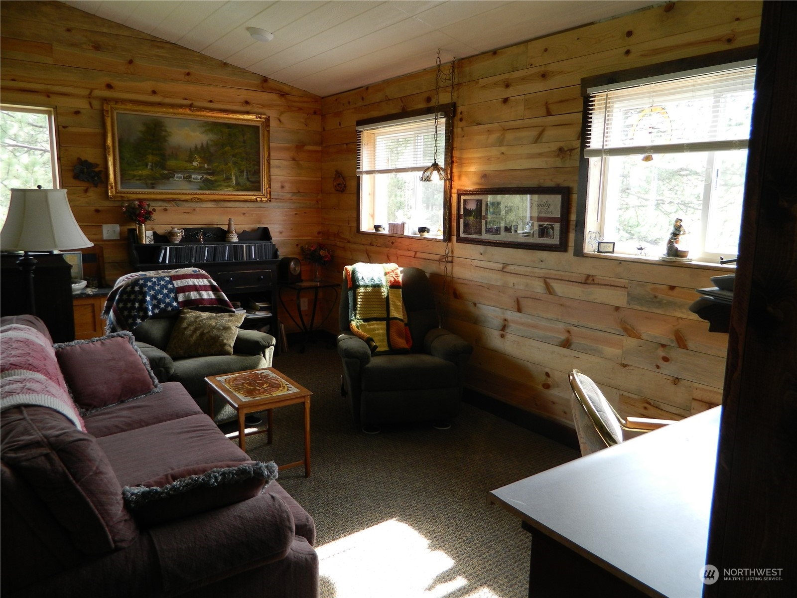 16 King Road Tonasket, WA 98855 - Photo 15 of 34 a living room with furniture and a flat screen tv
