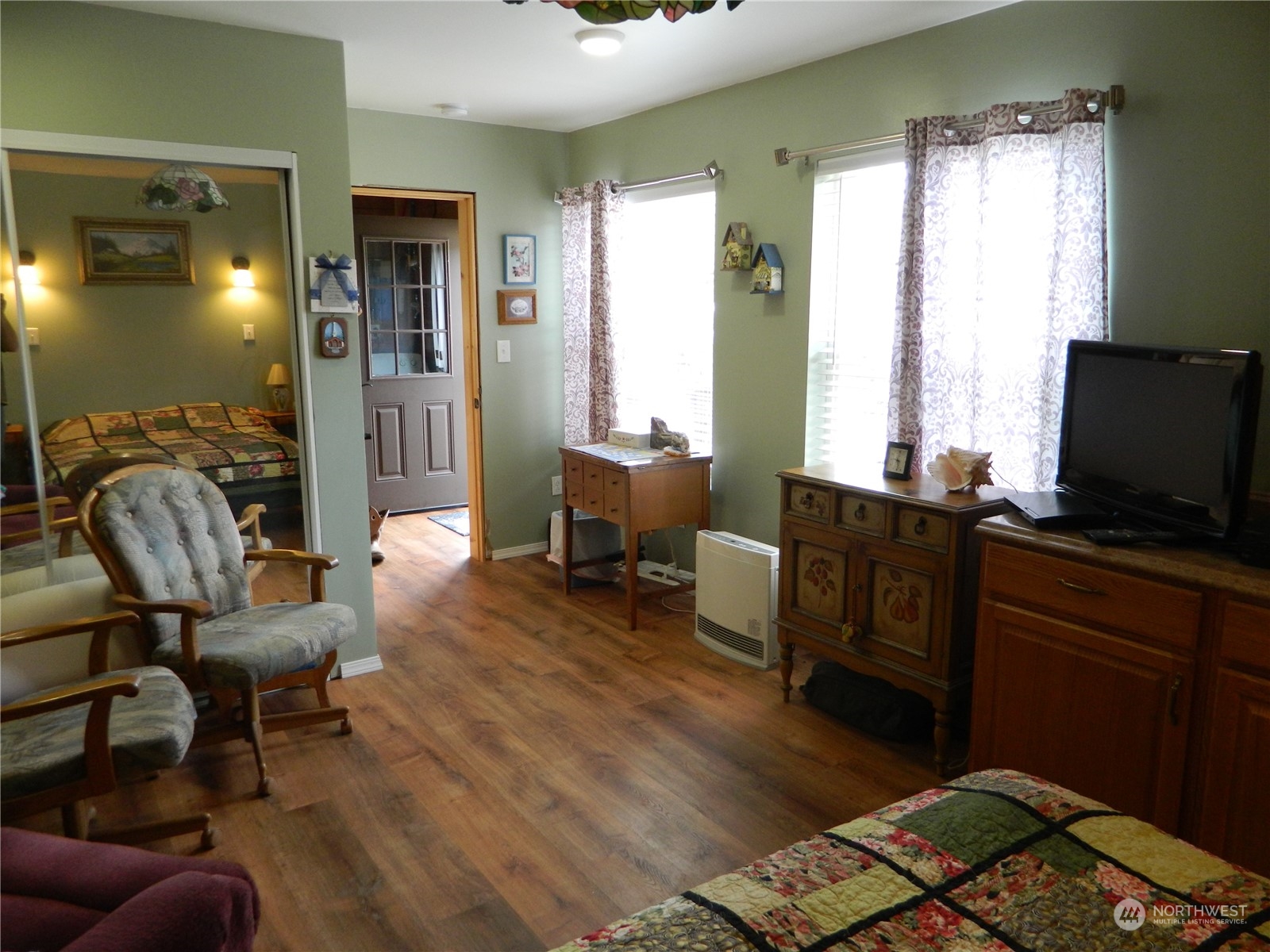 16 King Road Tonasket, WA 98855 - Photo 24 of 34 a living room with furniture and a flat screen tv