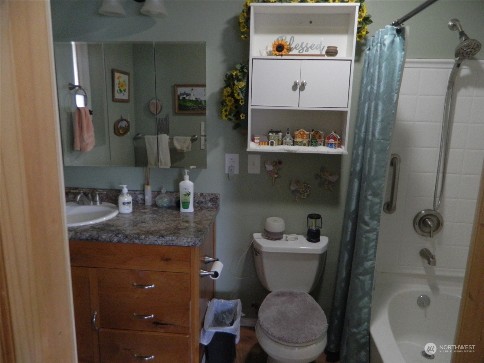 16 King Road Tonasket, WA 98855 - Photo 25 of 34 a bathroom with a granite countertop toilet sink and shower