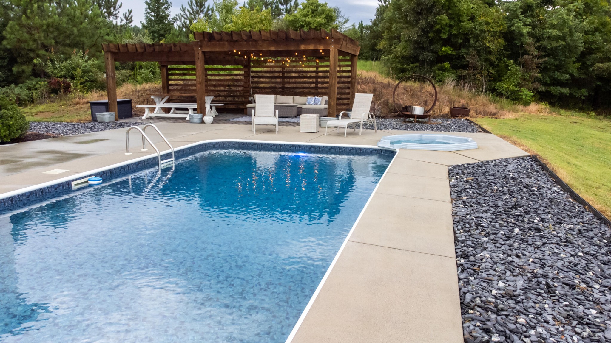 6925 Spring Place Road Southeast Old Fort, TN 37362 - Photo 15 of 46 a view of a swimming pool with sitting area