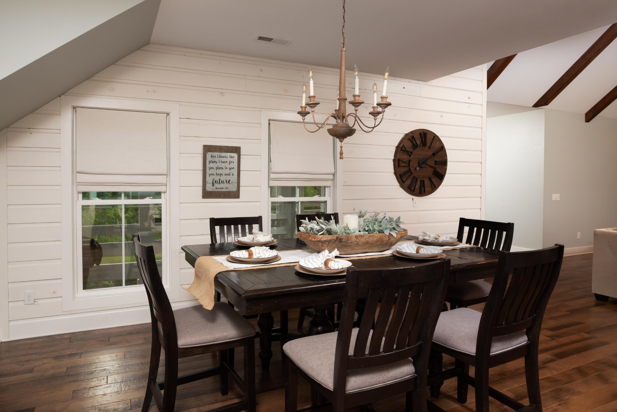 6925 Spring Place Road Southeast Old Fort, TN 37362 - Photo 16 of 46 a view of a dining room with furniture a chandelier and wooden floor