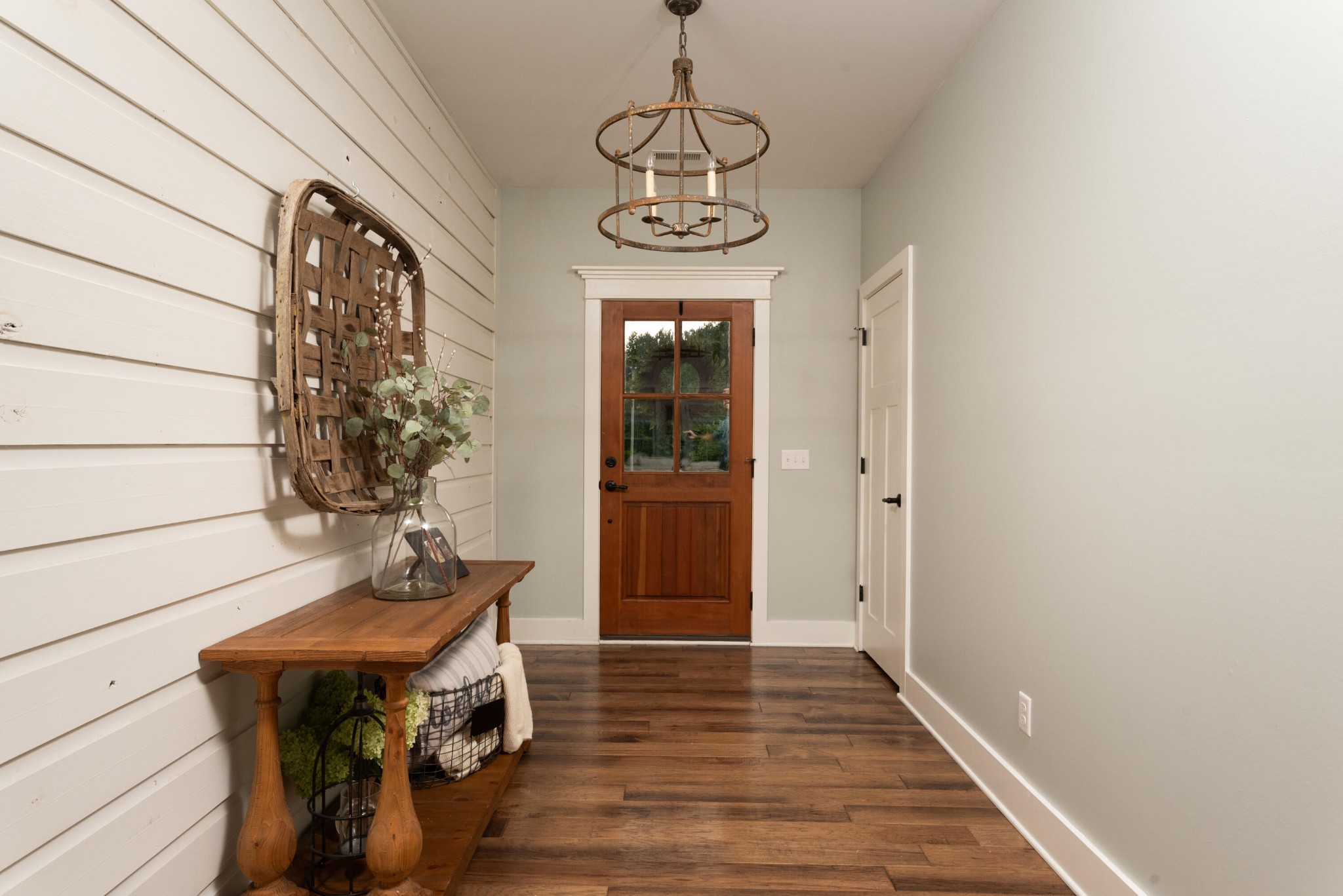 6925 Spring Place Road Southeast Old Fort, TN 37362 - Photo 17 of 46 a very nice looking room with wooden floor and chandelier