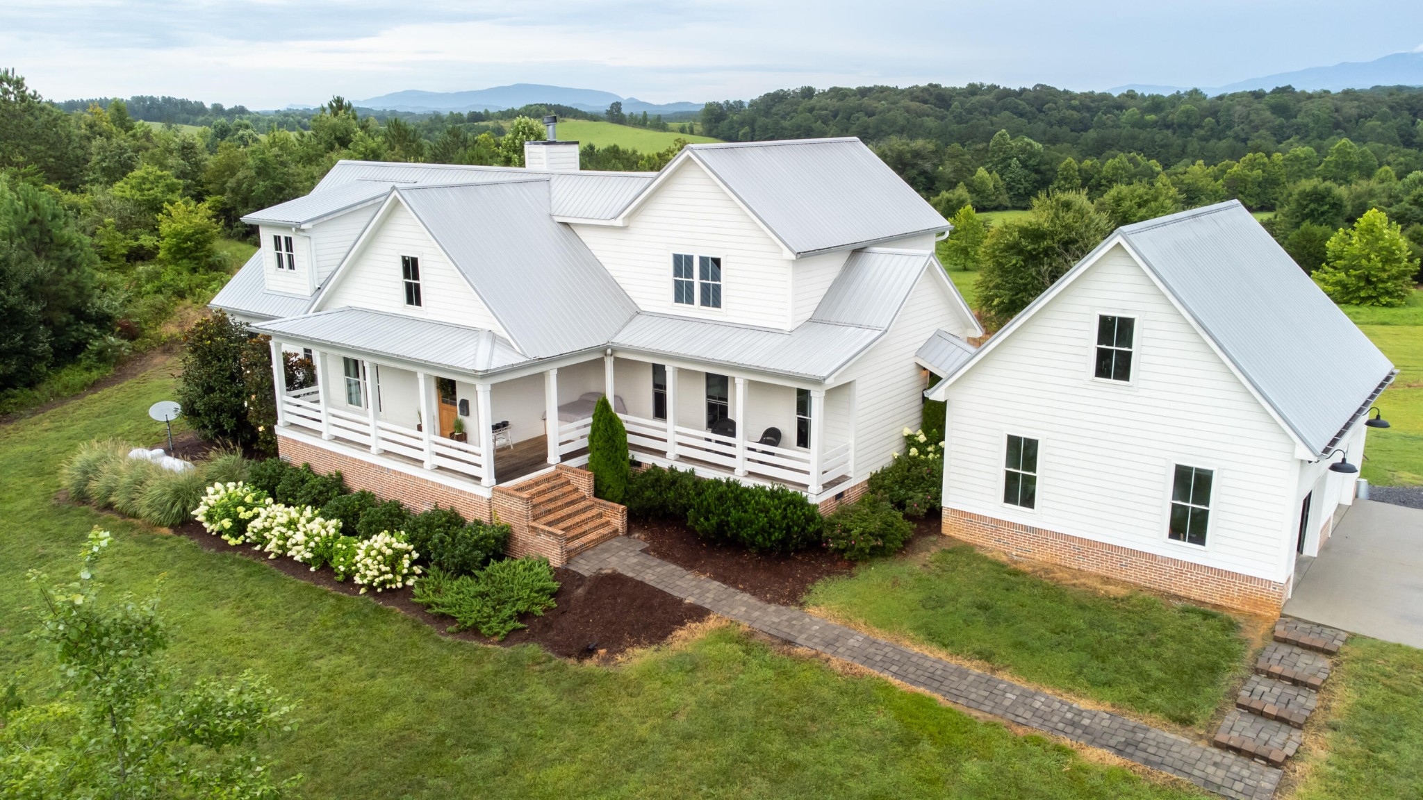6925 Spring Place Road Southeast Old Fort, TN 37362 - Photo 2 of 46 an aerial view of a house with a yard