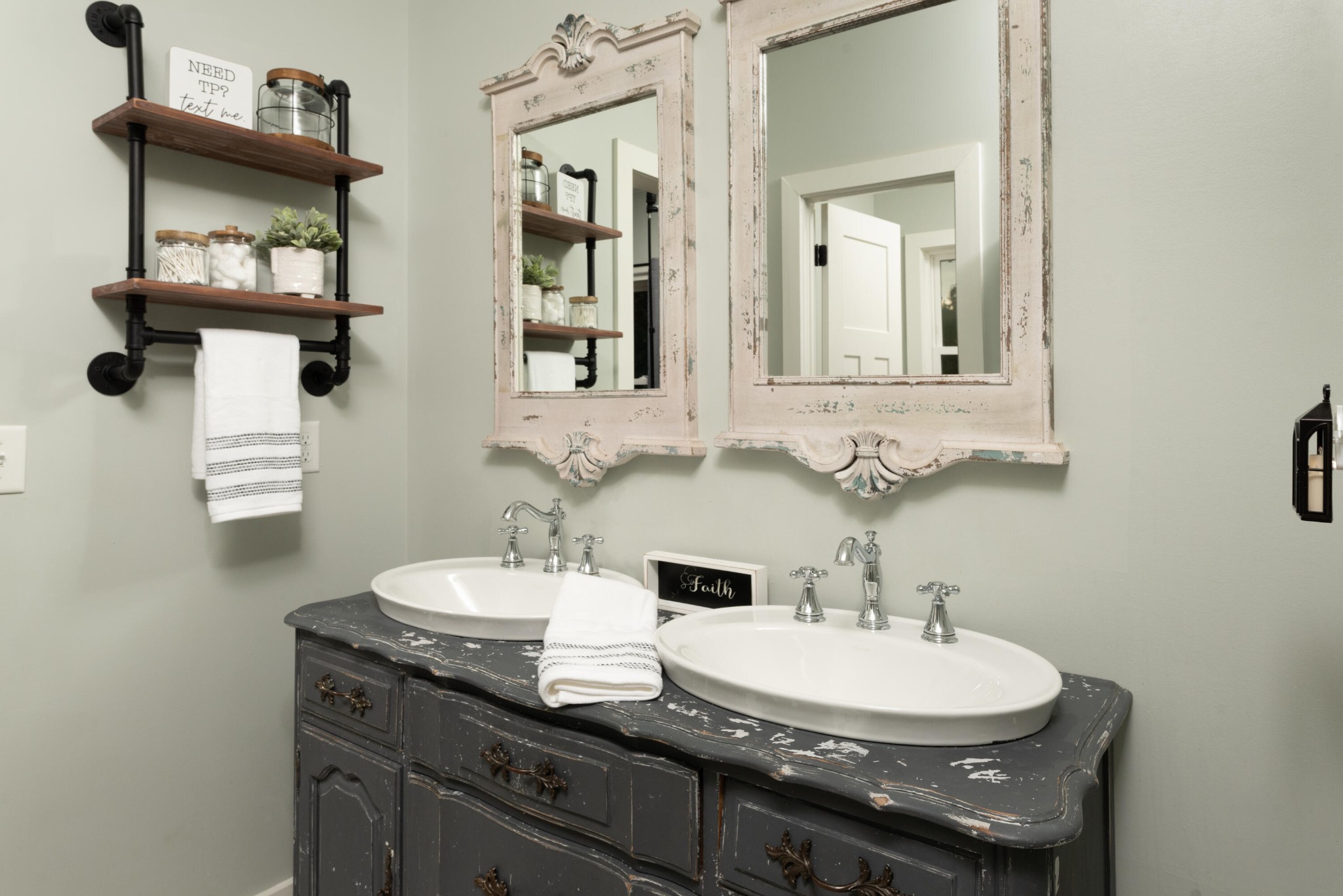 6925 Spring Place Road Southeast Old Fort, TN 37362 - Photo 28 of 46 a bathroom with a sink and a mirror