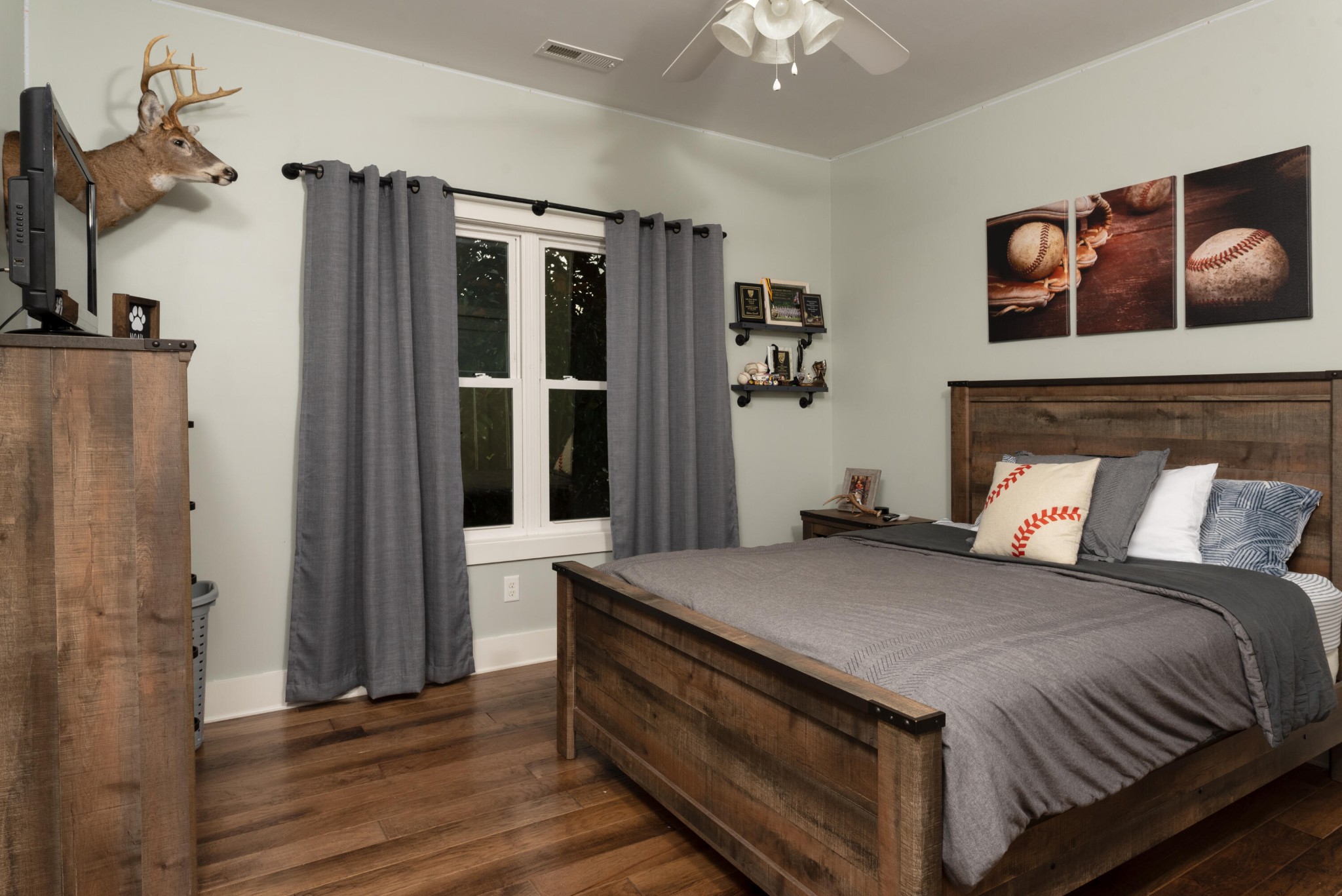 6925 Spring Place Road Southeast Old Fort, TN 37362 - Photo 29 of 46 a bed sitting in a bedroom next to a bathroom