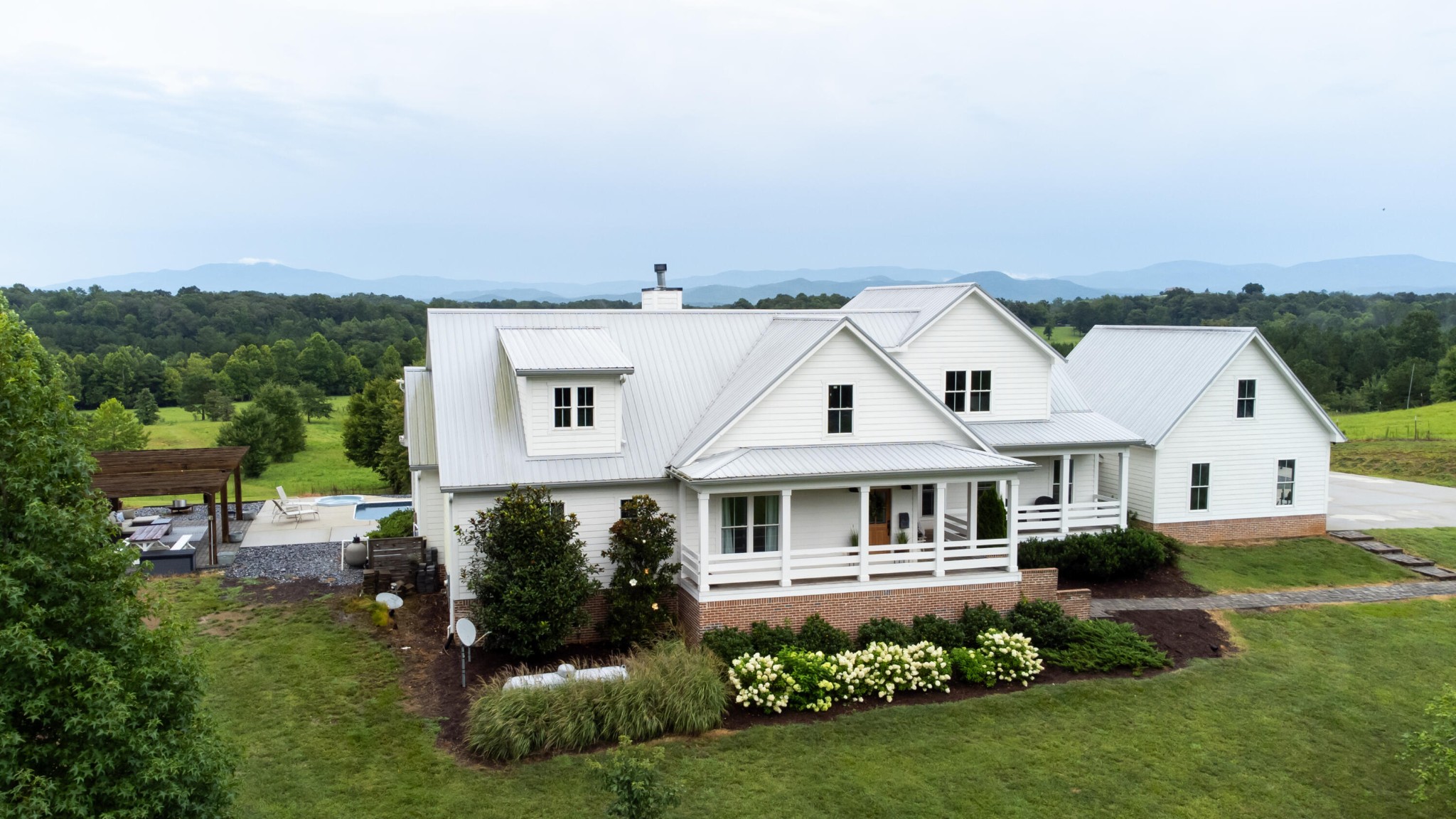 6925 Spring Place Road Southeast Old Fort, TN 37362 - Photo 3 of 46 an aerial view of a house with a yard