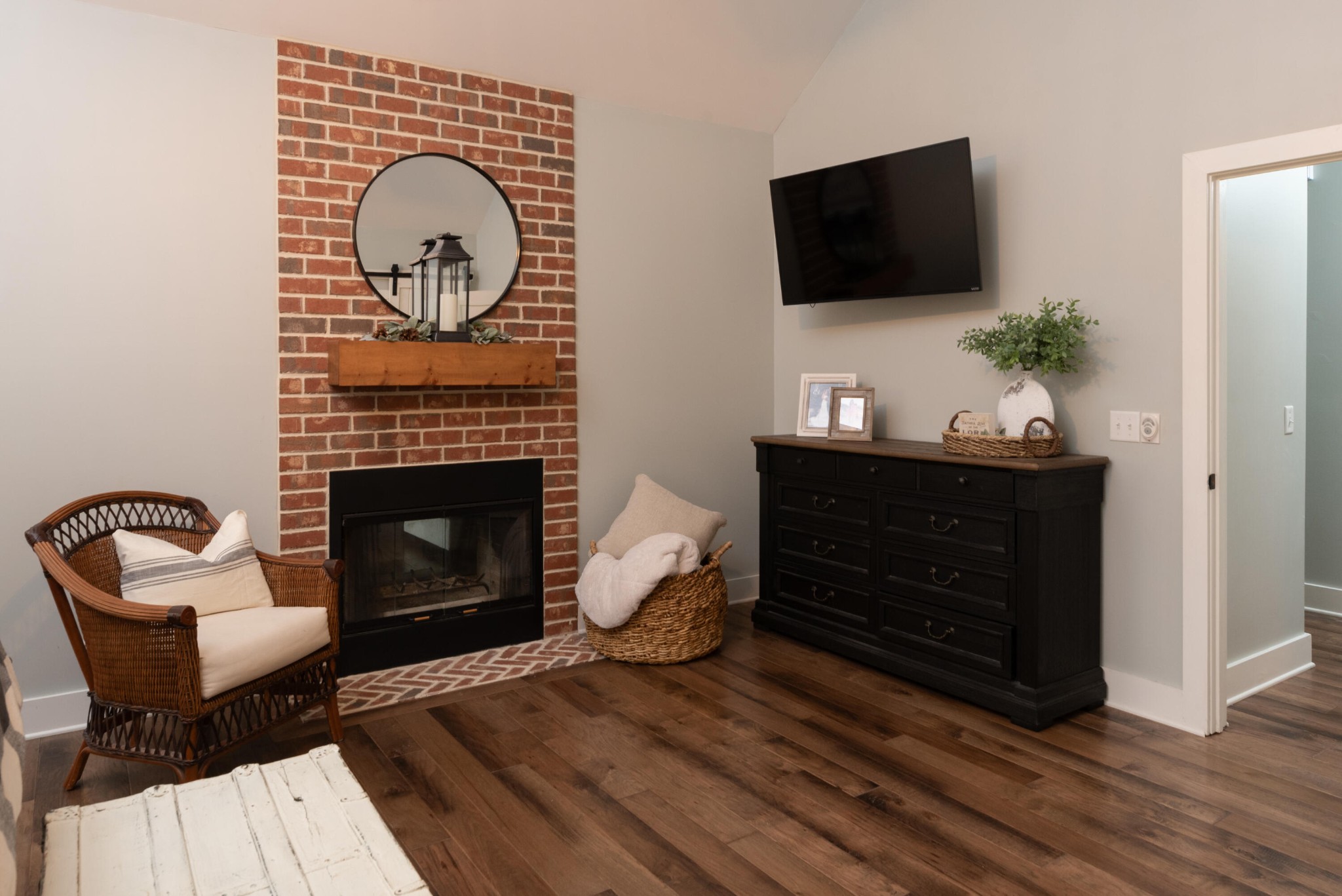 6925 Spring Place Road Southeast Old Fort, TN 37362 - Photo 31 of 46 a living room with furniture a flat screen tv and a fireplace