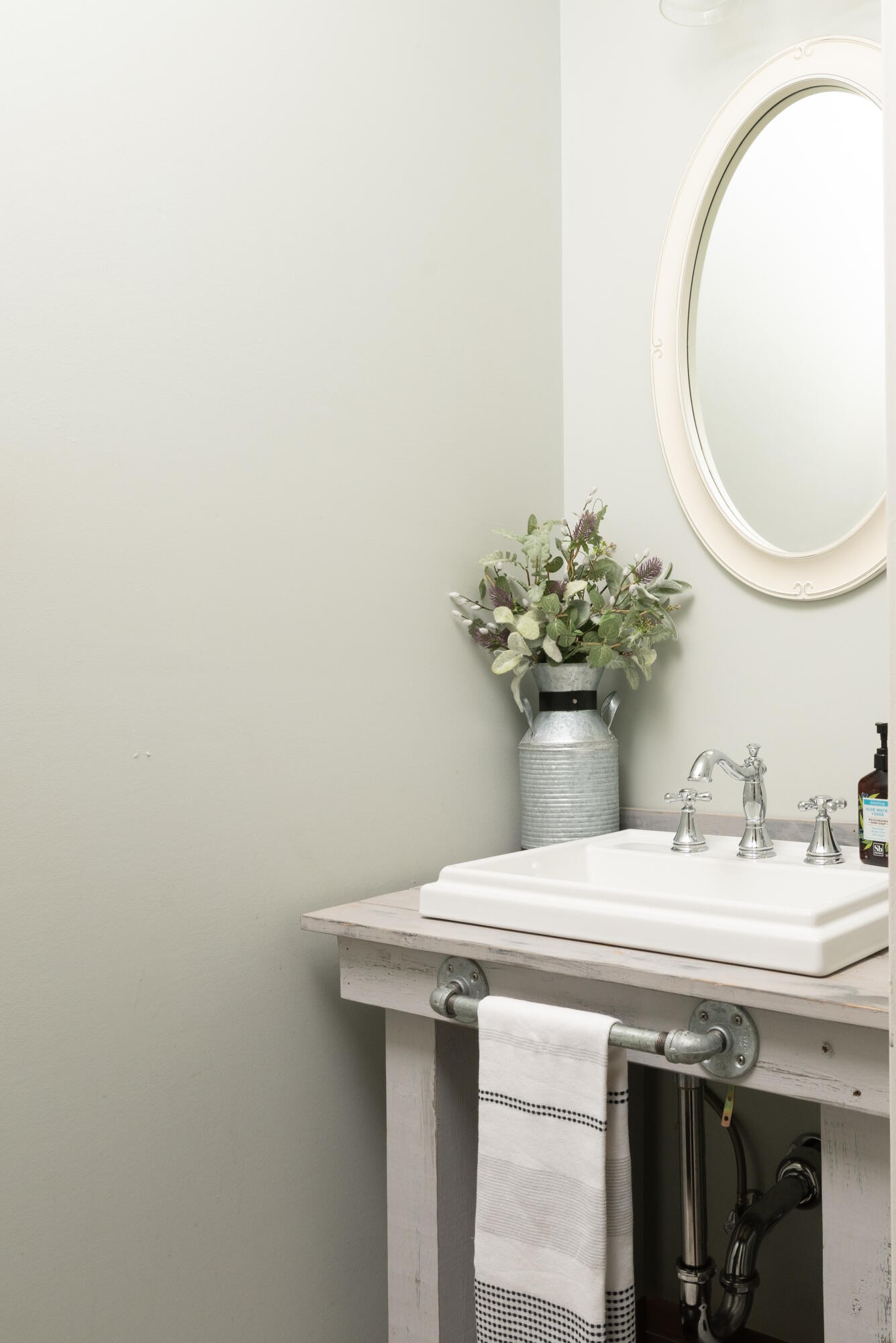 6925 Spring Place Road Southeast Old Fort, TN 37362 - Photo 34 of 46 a bathroom with a sink and a mirror