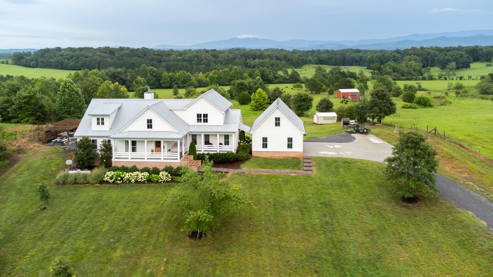 6925 Spring Place Road Southeast Old Fort, TN 37362 - Photo 46 of 46 a view of house with garden space and mountain view in back