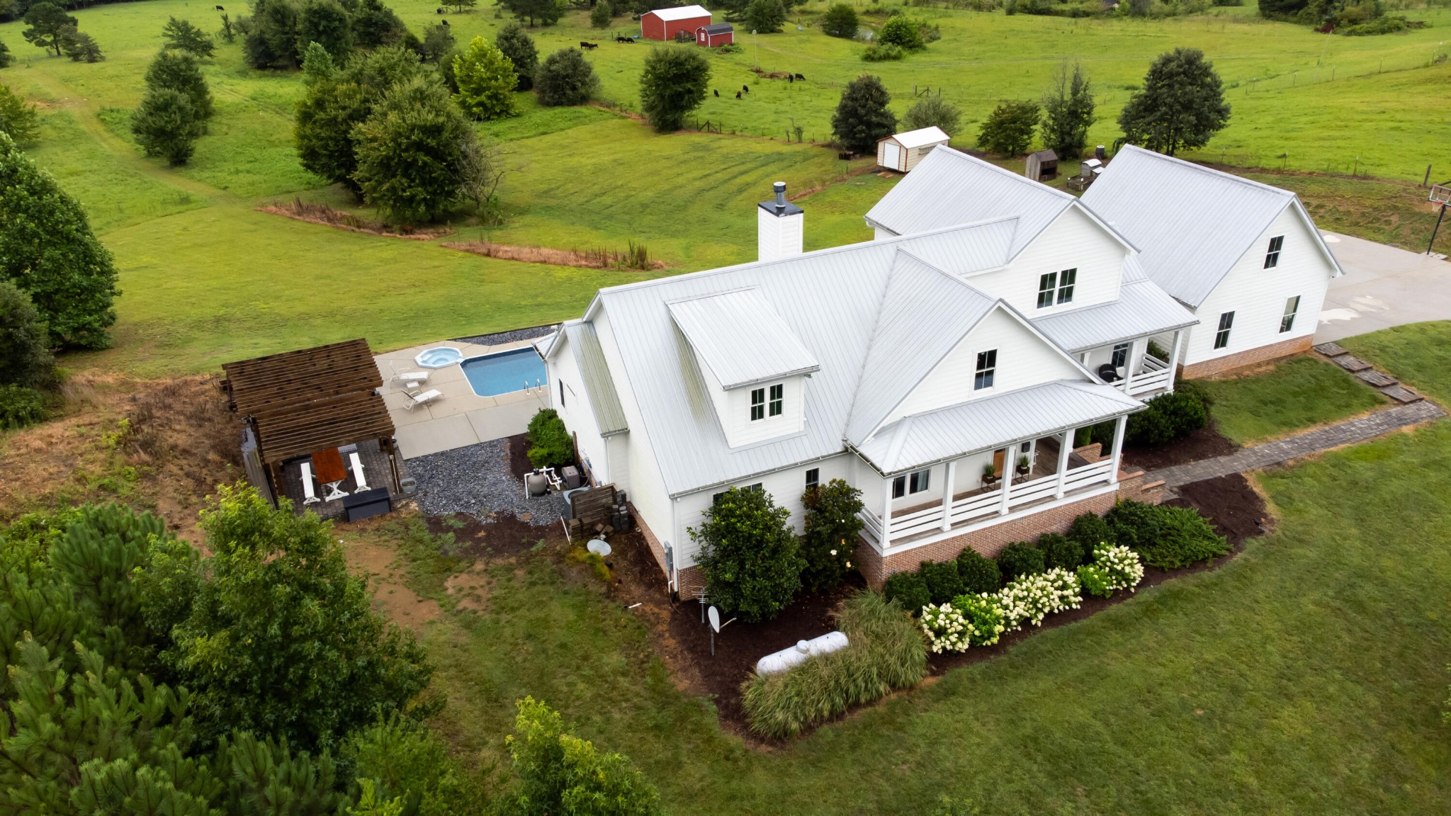 6925 Spring Place Road Southeast Old Fort, TN 37362 - Photo 6 of 46 an aerial view of a house with a garden and lake view