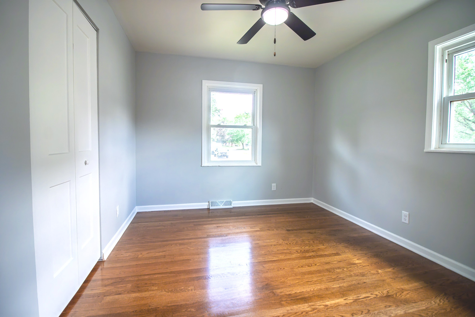 2602 Fairway Drive Joliet, IL 60435 - Photo 15 of 43 wooden floor in an empty room with a window