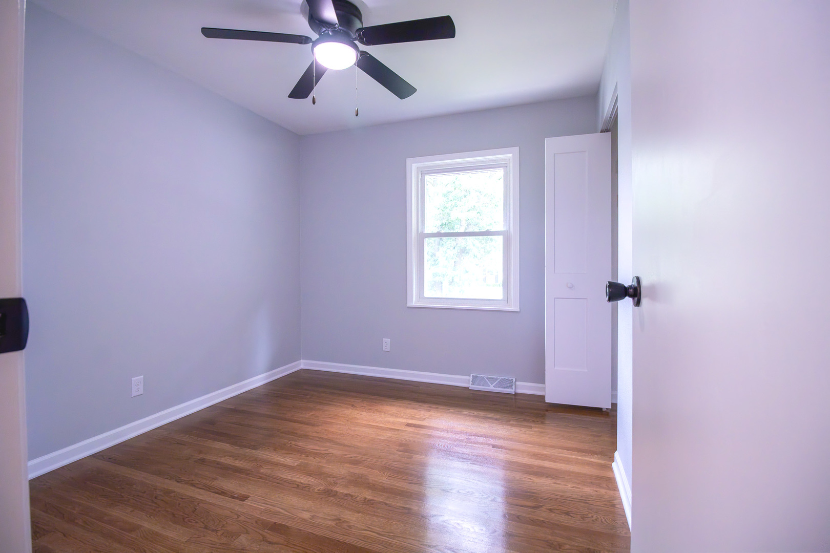 2602 Fairway Drive Joliet, IL 60435 - Photo 18 of 43 a view of empty room with wooden floor and fan