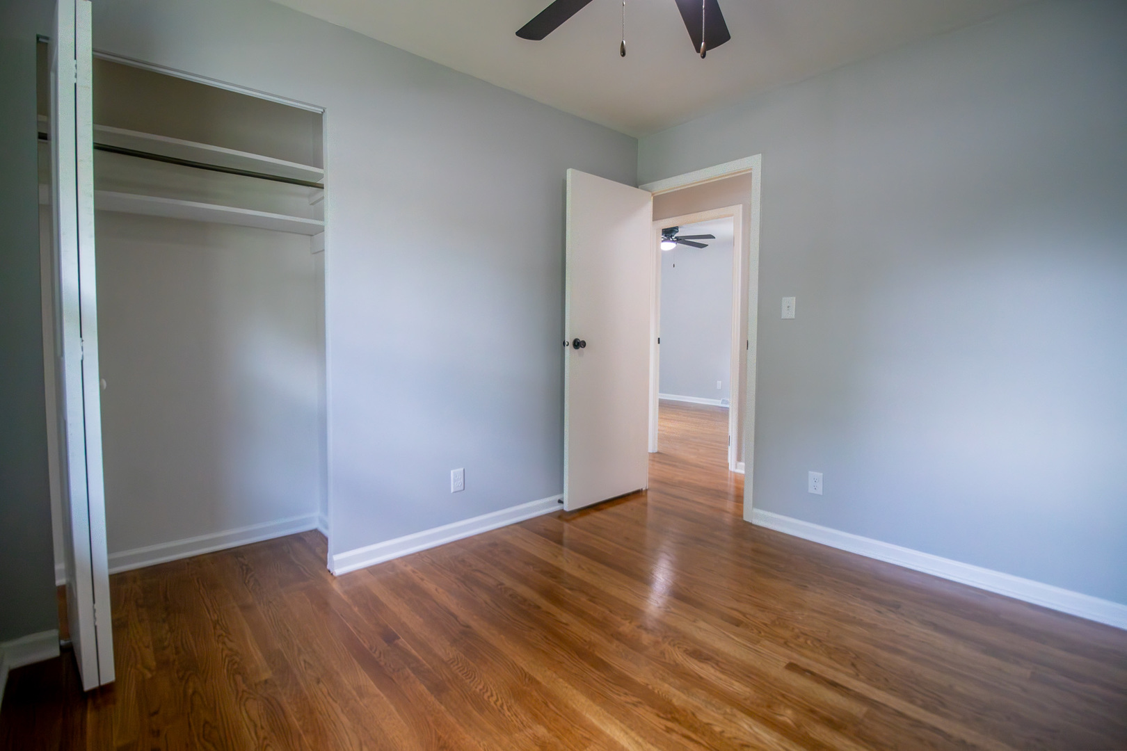 2602 Fairway Drive Joliet, IL 60435 - Photo 20 of 43 a view of an empty room with wooden floor and a window