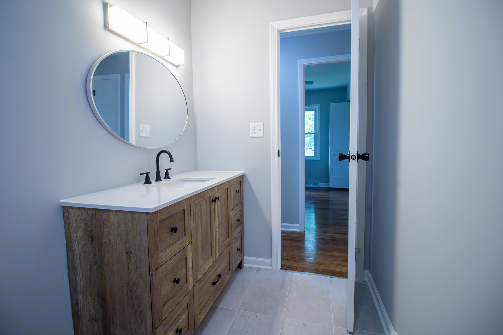 2602 Fairway Drive Joliet, IL 60435 - Photo 23 of 43 a bathroom with a sink and a mirror