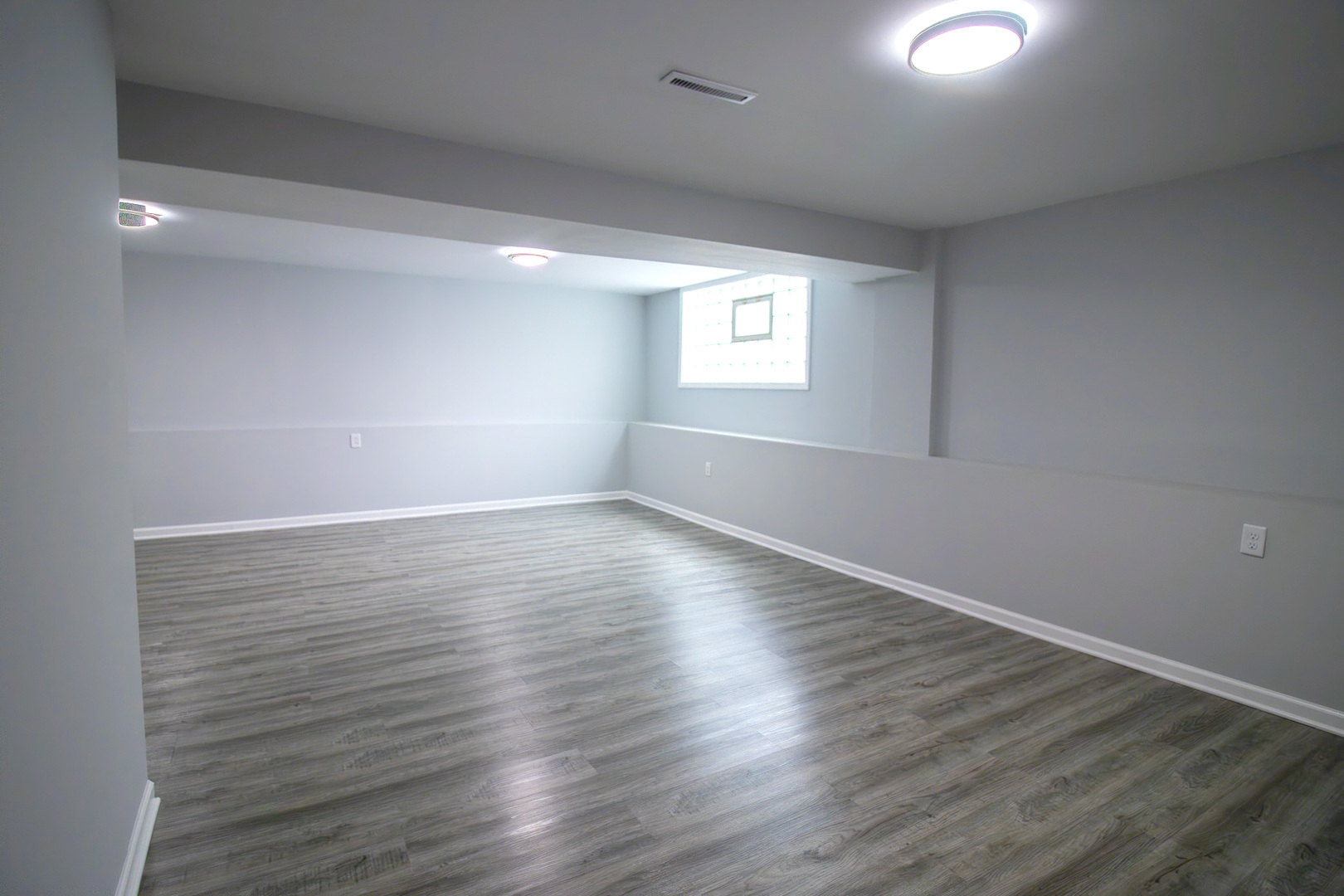 2602 Fairway Drive Joliet, IL 60435 - Photo 27 of 43 wooden floor in an empty room with a window